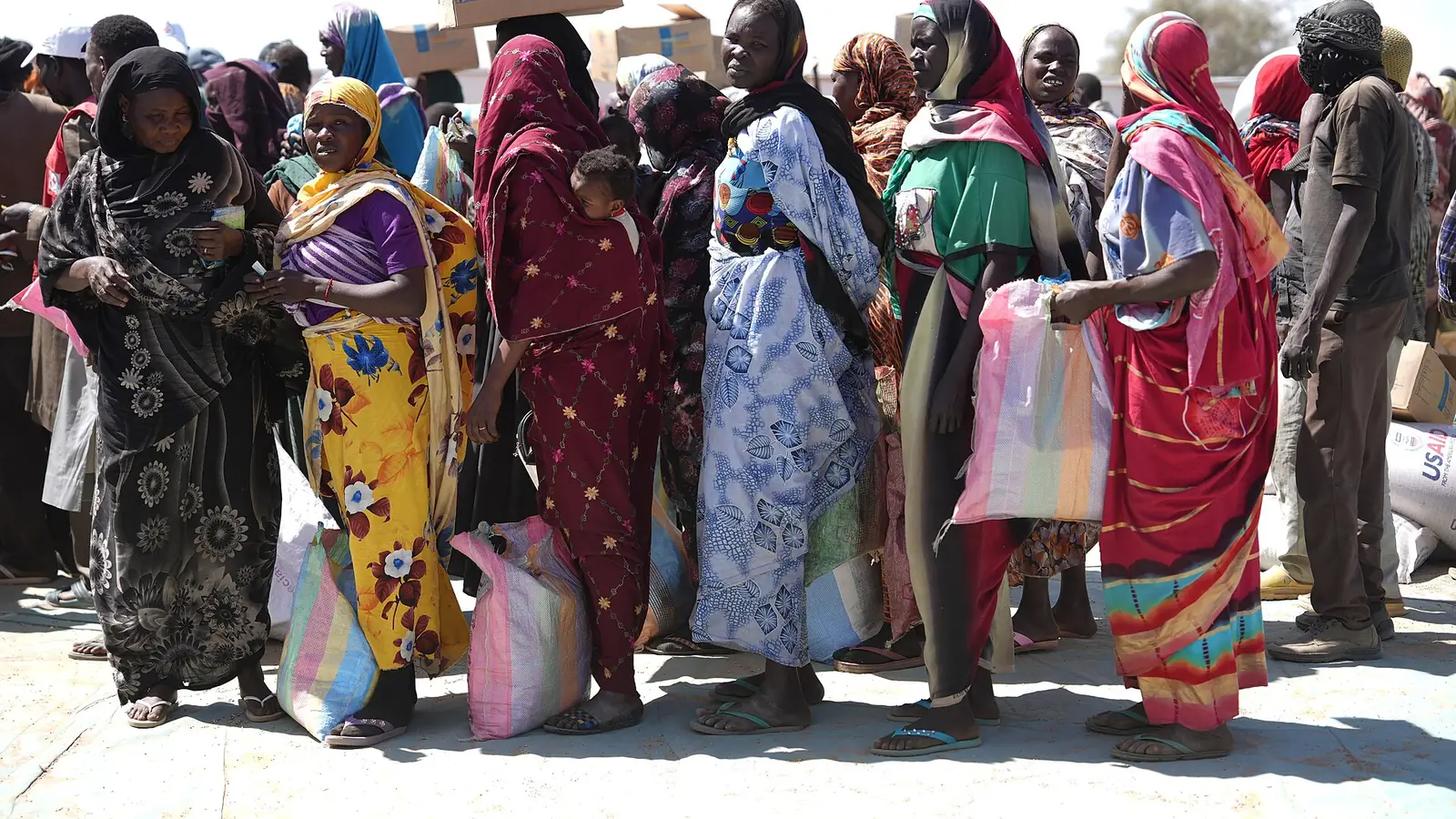 Sudanese refugee women queueing to register for aid in Adre, Chad